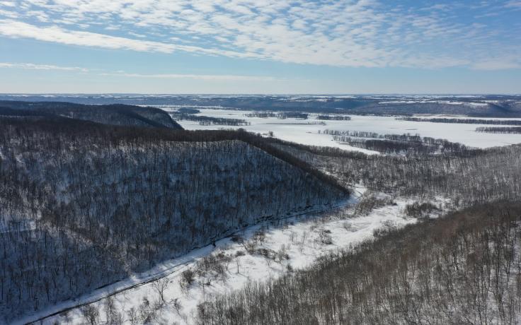 acquired land to expand protection of unique geology, rare plants, animals, and climate